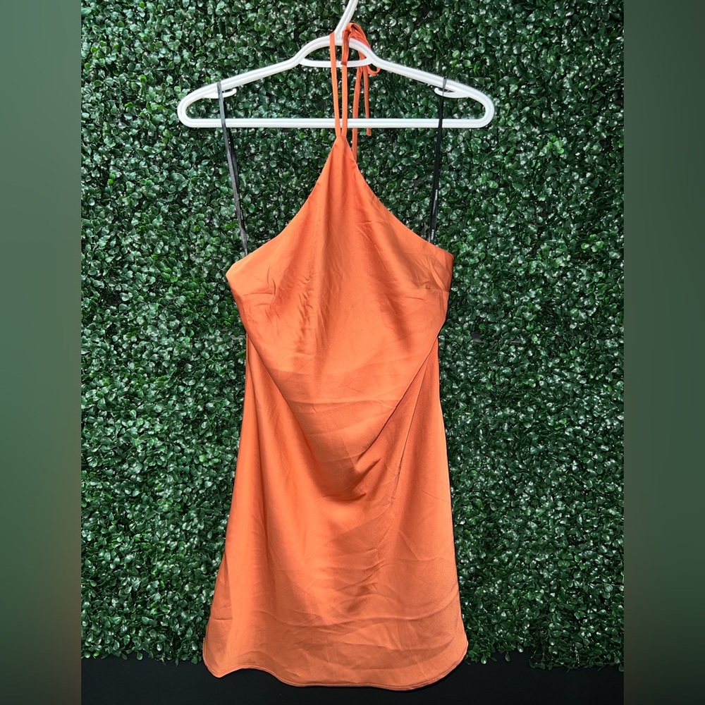 2 Orange Silk dresses; halter and asymmetrical spaghetti strap; Size medium